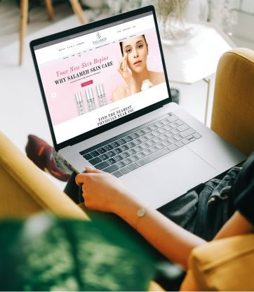 Person viewing a beauty ecommerce website on a laptop