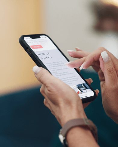 woman browsing a website on her mobile phone