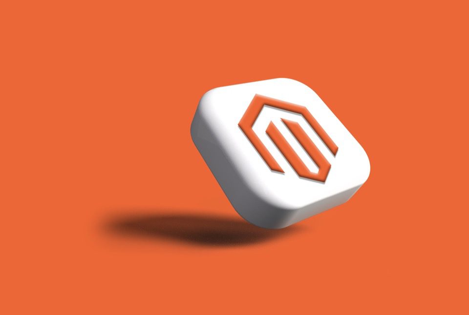Magento logo in front of an orange background