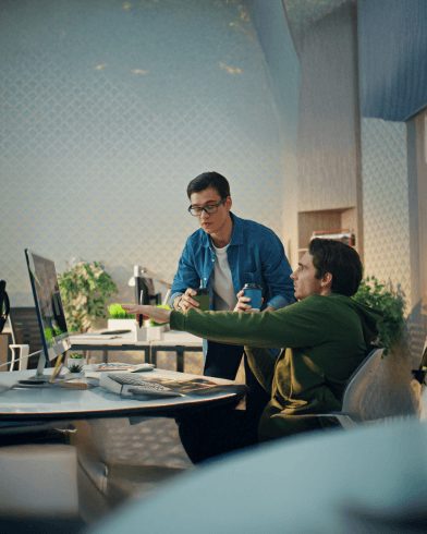 two guys discussing outsourcing