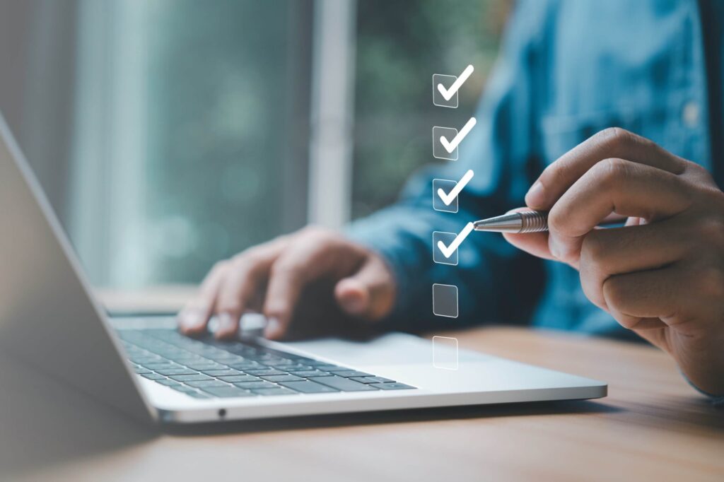 A person checking off a list, setting up dynamic remarketing
