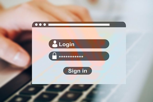 a login screen with a hidden password overlaid on top of a hand typing