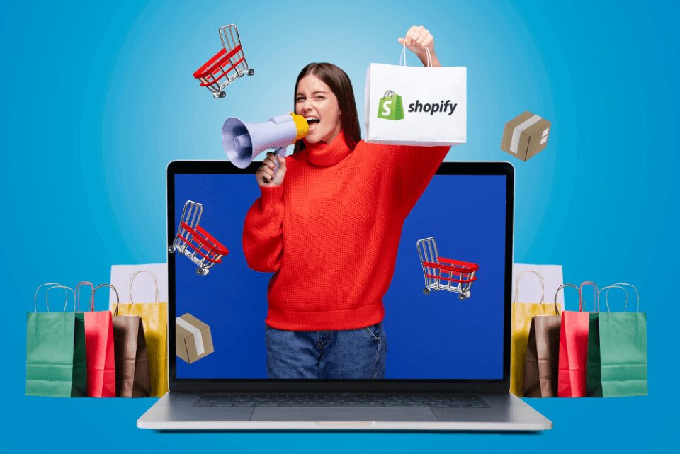 Woman holding a bag with the Shopify logo and a megaphone standing against a background with a laptop and shopping bags