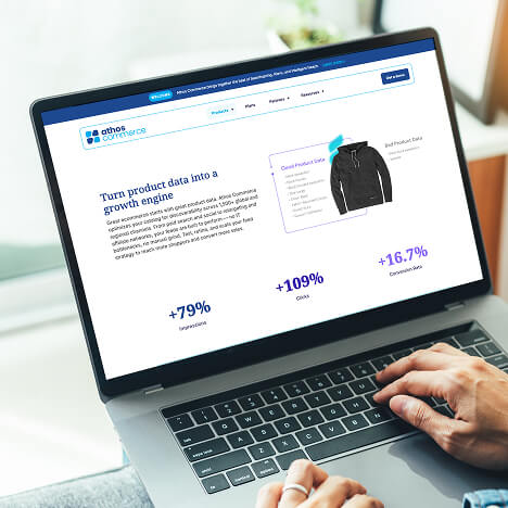 laptop showing the Athos Commerce website