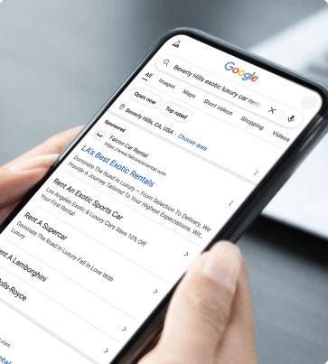 mobile phone showing Falcon Car Rental appearing in Google search results